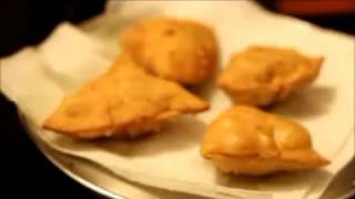 samosa  folding stuffing and frying samosas [upl. by Esereht10]