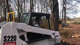 Bobcat S220 picking up truck [upl. by Terryn]