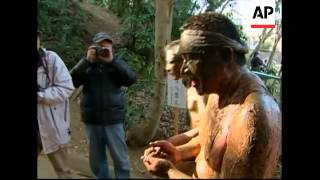 Men plunge into mud pool to ward of evil spirits [upl. by Ahsinet141]