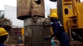 Hydraulic piling rig  Installation of a Casing pipe [upl. by Chilson]