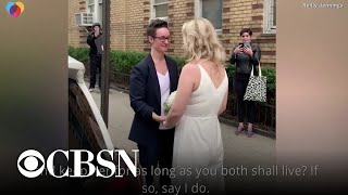 Couple holds wedding ceremony on New York City street amid coronavirus outbreak [upl. by Aym]