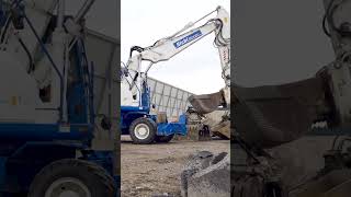 Hyundai HW210A is a multitool on the Swiss Recycling site [upl. by Janis]