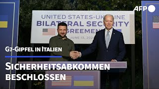 USA und Ukraine schließen Sicherheitsabkommen  AFP [upl. by Lleunamme]