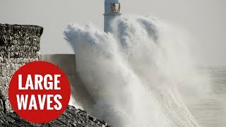 Large waves batter Porthcawl Lighthouse [upl. by Haela]