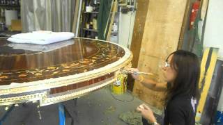 Gold leaf being applied in Italy to custom inlaid wood dining table  Italy By Web [upl. by Jeggar544]