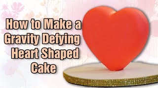 How to Make a Gravity Defying Heart Shaped Cake  We Heart Cake [upl. by Sousa780]