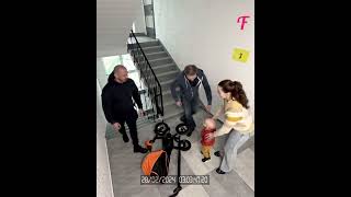 Neighbors lend a hand to mom stranded by broken elevator shorts [upl. by Zakarias807]