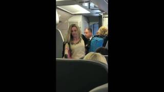 RAW American Airlines flight attendant says quothit mequot to angry passenger [upl. by Millwater101]