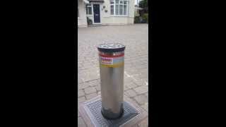 Using an automatic rising bollard for a driveway via a handheld remote control [upl. by Asen]