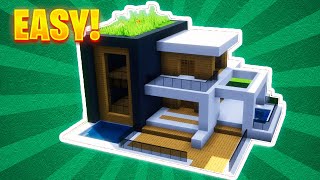 Minecraft How to build an Easy Modern House 10 [upl. by Arahsat]