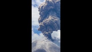 Indonesian volcano spews mountains of ash into the air [upl. by Halivah]