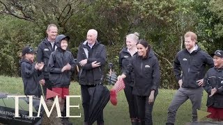 Whats Welly Wanging Meghan Markle Beat Prince Harry At This Cool Boot Throwing Game  TIME [upl. by Naicad]