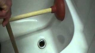 How to Unplug or clear a bathtub drain Easily [upl. by Burrill]