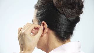 How to place the Oticon hearing aid with Micro mould on the ear [upl. by Broder240]