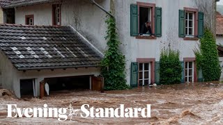 German floods death toll climbs over 100 Merkel pledges support [upl. by Accisej212]