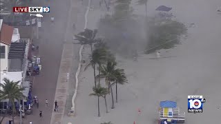 Waterspout hits Hollywood Beach knocks over beachgoer [upl. by Ansilme]