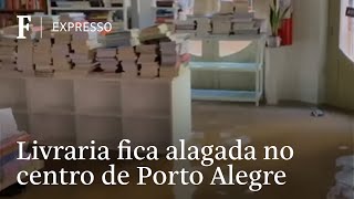 Enchente em Porto Alegre inunda livraria Taverna e põe em risco móveis e livros [upl. by Neal]