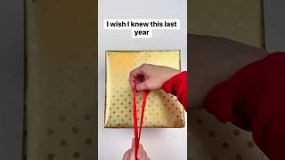 How to tie a Christmas gift bow bow wrapping christmastime presents christmastips [upl. by Miharbi99]