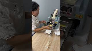 Home cutting and stuffing machaine stuffing chinesefood food viralshorts cuttingmachine [upl. by Jardena222]