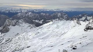 Zugspitze in the Alps going up the highest mountain in Germany [upl. by Horlacher519]