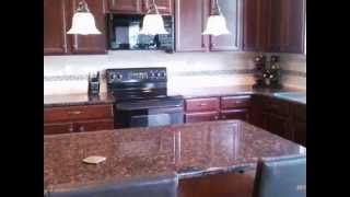 TAN BROWN GRANITEDark WoodHalf bullnose6040 Sink Concord NC 4 25 12 [upl. by Atat744]