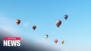 Colorful hot air balloons took to Crimean skies as people participated in air biathlon [upl. by Aisyat]