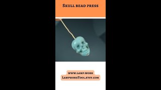 Crafting skull bead lampworking [upl. by Emyaj6]