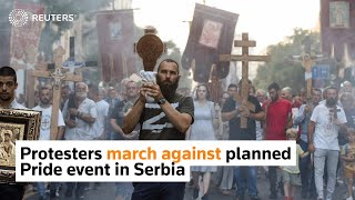 Protesters march against planned Pride event in Serbia [upl. by Steiner]