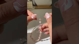 How to make a beaded flower necklace 🌼🪷 Beaded daisy necklace tutorial [upl. by Ettenotna]