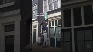 Maccabi Tel Aviv hooligans tear down Palestinian flags from homes in Amsterdam [upl. by Enimajneb]