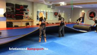 Setting up the new Dollamur mats Kristiansand Kampsport Senter Norway 2014 [upl. by Iridissa]