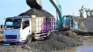 Loading Driving Overloded Dump Truck by Kobelco SK200 Excavator Isuzu Elf NMR 71HD [upl. by Annayak]