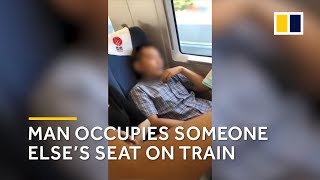 Man occupies someone else’s seat on train in China [upl. by Fidelas]