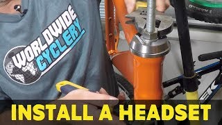 How to install a headset  Part 1 How to build a MTB [upl. by Puritan98]