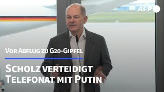 Scholz verteidigt Telefonat mit Putin  AFP [upl. by Arimay]