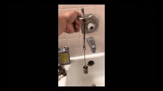 How to Fix a Stuck Drain Stopper in the Bath Tub [upl. by Hakeber]