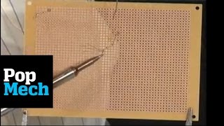 How to Solder to a Circuit Board  PopMech [upl. by Brenner]