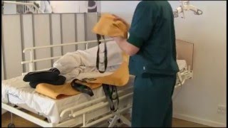 Guldmann Ceiling Lift Lifting of leg  patient lying on the side [upl. by Coke]