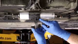 Replacing an undercar fuel filter on a BMW  How To [upl. by Ahsenauj204]