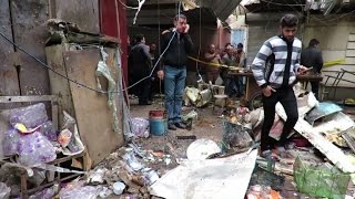 Central Baghdad market blasts kill dozens [upl. by Nij800]