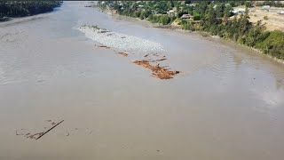 Debris floating down the Fraser River in Lillooet at the Old Bridge [upl. by Corso]