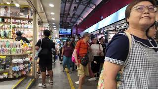 Singapores street markets are insane Walking around Bugis street market [upl. by Gennie]