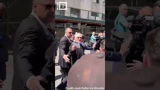 quotSelloutquot Robert DeNiro Angered by Heckler Outside Trump Trial in NYC [upl. by Yatnahc]