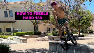 HOW TO FEEBLE HARD 180 on a BMX bike [upl. by Urba]