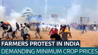 Police in India try to stop farmers protesting in New Delhi  ITV News [upl. by Anelegna]