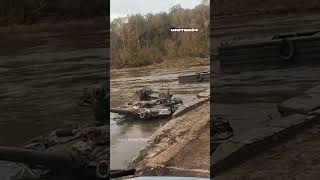 Russian tank destroyed by Ukrainian soldiers on a pontoon crossing warinukraine tanks russia [upl. by Sillaw]