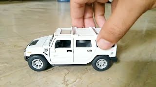 Hummer H2 SUV 132 Scale Kinsmart Diecast Model Cars [upl. by Wieche643]