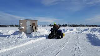 Grizzly 550 with tracks plowing on the lake [upl. by Kathe]