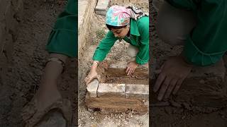 Building a stove with bricks and mudstraw mix [upl. by Arvo]