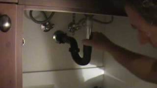 How to clean out a sink drain Reinstalling the adjustable ptrap [upl. by Asserac]